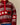 Jamie Cropped Button Snap Sheep Sherpa Red in red and white featuring a snap-button placket and rows of sheep icons.