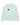 Warm & Wonderful Cotton Linen Crew Neck Sheep Sweater Blue in light blue cotton-linen with a repeating cream-colored sheep pattern and one solitary black sheep on the upper left chest, reminiscent of the iconic Princess Diana sweater.